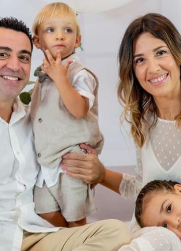 Xavi with his wife and children